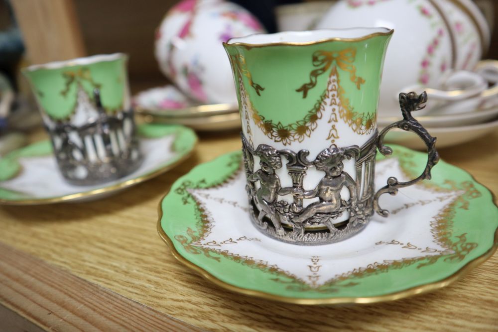A pair of Coalport silver mounted coffee cans and saucers, together with other mixed ceramics and glass